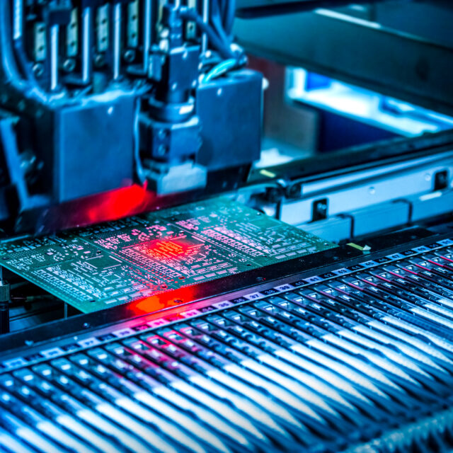 Electronic circuit under surface-mounting machine.
